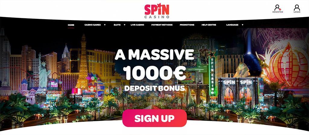 Spin Casino homepage, massive €1000 deposit bonus banner, Las Vegas city lights, sign up button, register and login options